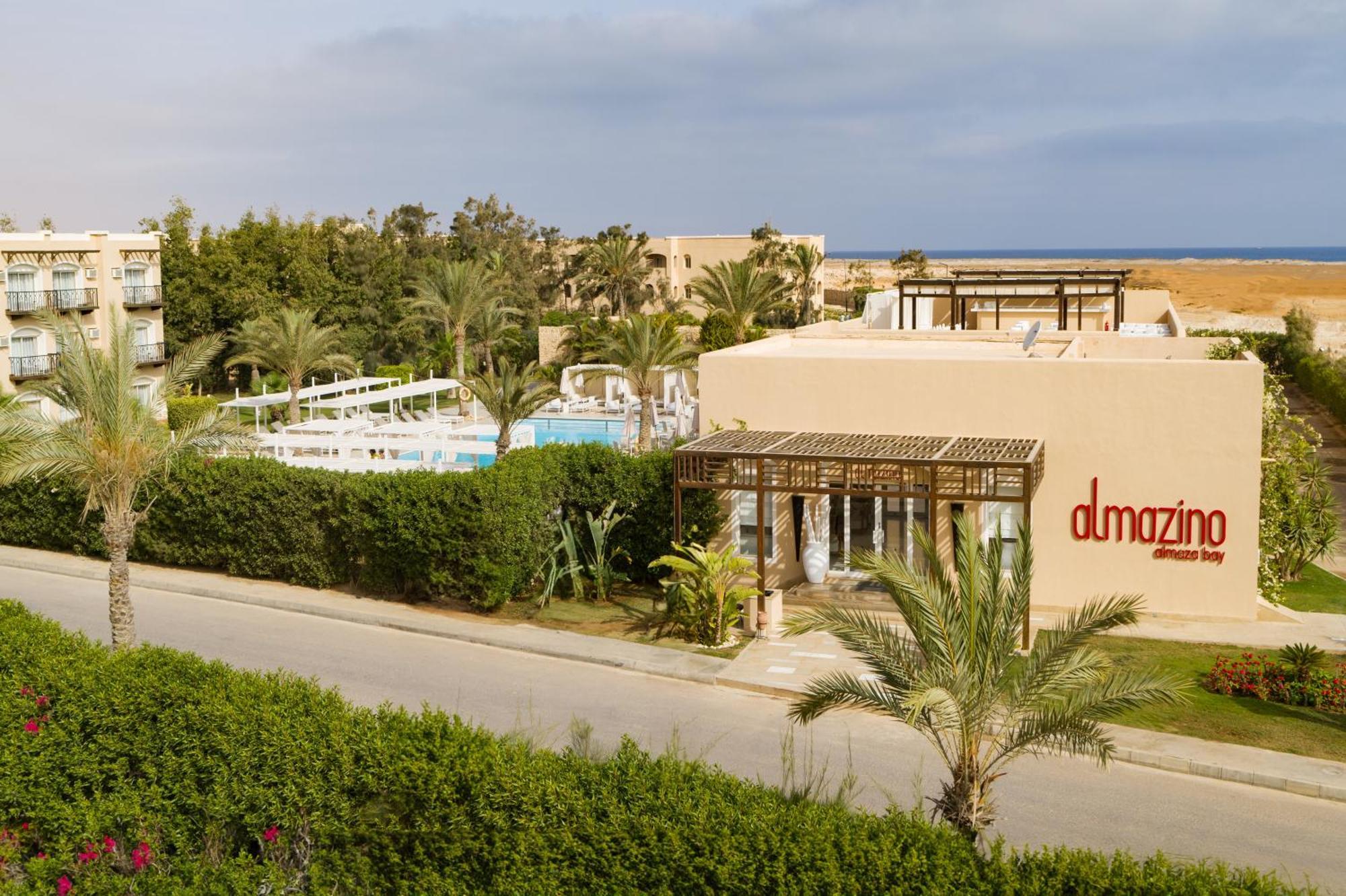 Отель Jaz Neo Almazino, Almaza Bay Majid Abu Zayd Экстерьер фото