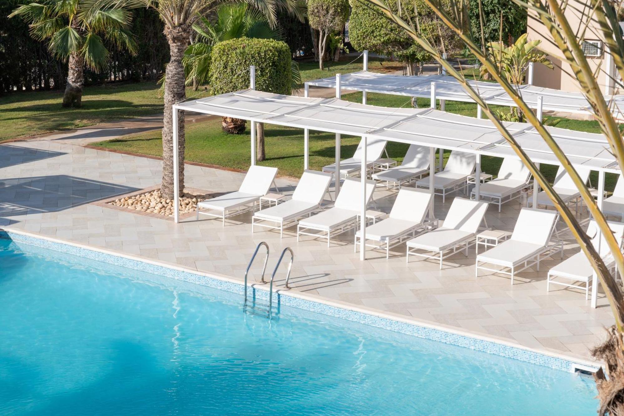 Отель Jaz Neo Almazino, Almaza Bay Majid Abu Zayd Экстерьер фото